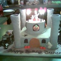 Haunted Castle This cake was done for my son's 8th Bday. He begged for a Haunted Castle.This was my first castle. The turets are MMF covered, the...