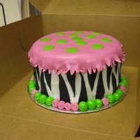 13Th Birthday Cake I made this cake for my friend's daughter. There was a black "13" put on top of the cake, and candles in each lime circle...