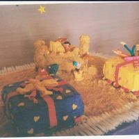 Allyson's 2Nd Birthday tres leches cake with peach filling and the gifts are chocolate cake all buttercream icing with fondant accents except castle which is...