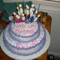 Bowling Cake I made this for my step-daughter's bowling birthday party... It was a huge hit! The pins and bowling ball are chocolate. It was my...