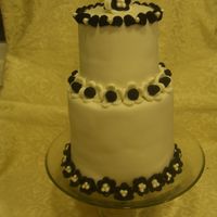 Black Tie I made this for our school auction that was Black and White in theme. The party was great! My husband was so proud of my cake that HE...