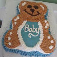 Img_1671.jpg Chocolate cake with peanut butter icing for the fur, whipped icing for the white and blue and chocolate for the eyes, nose, and mouth. Idea...