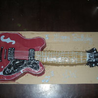 Guitar Cake This a cake I did for my Mom's friend!! This guitar cake is pound cake with whipped icing. No Fondant!! He hates fondant!! Neck of...