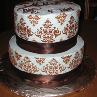 Stenciled Buttercream Baptism cake for our Pastor's newborn. My first time stenciling. Used Sam's Club BC, but I must have gotten one of the batches...