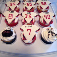 Hockey Cupakes Cupcakes for the end-of-season party. Chocolate jerseys.