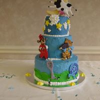 Hey Diddle Diddle Cake 3 stacked cakes. BC frosting w/MMF figurines
