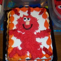 Elmo Cake Freehand Elmo with the "grass/fur" tip and mini marshmallows for the eyes and nose. Used a partially decorated cake I got from...