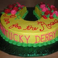 Kentucky Derby Cake This is one I did for a Kentucky Derby party (kind of a holiday in our state) :o) Yellow cake, buttercream icing and roses.