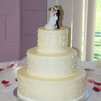 Dotted Wedding Cake My very first wedding cake! Boy was I a nervous wreck until it was there and set up. The cake was French vanilla and the filling was almond...