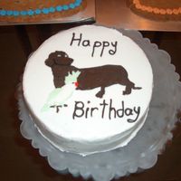 25Th Birthday Cake This is a BCT of a mini daschund and a cockateil i made for my bf for his 25th birthday. it is a choclate cake w/ mint chocolate chip ice...