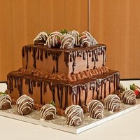 Chocolate & Strawberry Groom's Cake Chocolate cake with chocolate buttercream, chocolate ganache, and chocolate dipped strawberries.