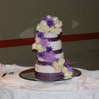 First Cascading Flowers Cake! this was for my friend's wedding. i was sooo stressed about cascading the flowers but i think it turned out pretty good. they loved it...