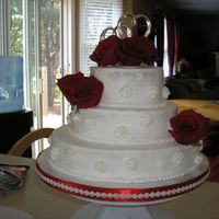 3 Tier Buttercreme. Real Roses With Fresh Strawberry And Whipped Creme Filling. 