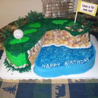 Maui Golf Hole Overlooking Ocean Golf cake is 2 layer Marble Cake w/ snow white buttercream colored muti shades of green and beigeOcean/Beach is 1 layer Marble w/ snow...