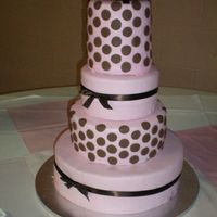 100_0051.jpg My 2nd wedding cake and it was given to me a week before the wedding. Strawberry w/chocolate marbelized cake and strawberry glaze filling....