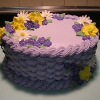 Wilton Course 2 Final Cake I love how this cake turned out. The final cake for course 2. Oval cake with basketweave. I left the birds out.