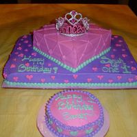 1St Birthday For A Princess 1/2 sheet with 2 10" layers, 6" round smash cake buttercream and royal icing.