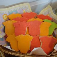 Onesies Cookies These are onesies sugar cookies covered in fondant - made to match the cake.Thanks for looking!!!