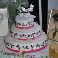 50Th Anniversary Cake I made this cake for my aunt and uncle's 50th wedding anniversary. It's all MMF, swirls are BC. The tiers are 6", 10",...