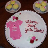 Baby Shower Cupcake Cake CCC made from about 40 cupcakes. Frosted in BC and onsie is MMF