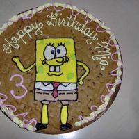 Spongebob Cookie Cake A giant 12" chocolate chip cookie with a mmf spongebob. Made for my bf's little sister with help from my bf and his other sister...