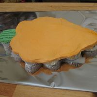 Carrot Cupcake Cake A little boy who was turning 3 requested a cake in the shape of a carrot, so cute! And yes, it was carrot flavored too ;)