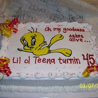 Teena 45Th yellow cake - buttercream icing.. curly ribbon
