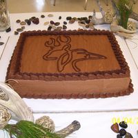 Ashtin Grooms Cake Chocolate two layer cake with chocolate icing as filling,,