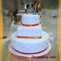 Ashtin & Chelsea My very 1st wedding cake,, and it was a huge success.. Everybody loved it. I used sugarshacks method for buttercream icing and after a few...