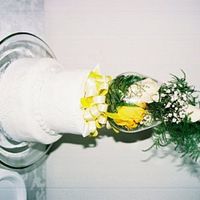 Anniversary Cake This was my first two tiered cake. The cake topper is a replica of the couples original wedding cake topper.