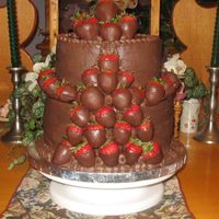 Embrace MY FIRST GROOM'S CAKECC with CB, fresh strawberries for the filling and chocolate dipped strawberries to embrace-