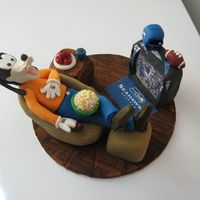 Just Goofying Around I made this for my now father in-law's birthday. This was placed on top of a round Carrot Cake. It was made from fondant/gumpaste.