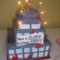 Superheroes 2 This is a burning skyscraper with Batman, Robin, Superman, and Wonderwoman. It was for a friend's daughter's 7th bday. Each layer...