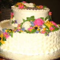 Bridal Shower Cake I saw another cake I really liked with the two layers. All I did was add spring flowers.