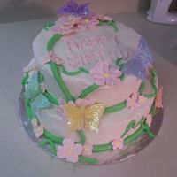 Butterfly Cake This was my first stacked cake, it turned out much better than I thought it would!! Still not sure about the colors though. But it was a...
