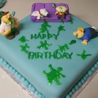 Family Guy---Puke-A-Thon Episode This cake was for my brother-in-law. A chocolate cake with peppermint filling. fondant covering and figures. The "puke" is a...