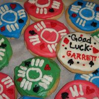 Poker Chips Cookies I made for my boyfriend. Sugar cookies with melted white chocolate discs, then colored with wilton colors. I spooned the chocolate...