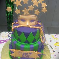 Mardi Gras Graduation The mask, beads, and stars are all made out of fondant