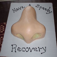 Stuffy Nose A get well soon cake for someone who had sinus surgery. BC icing with piping gel snot.