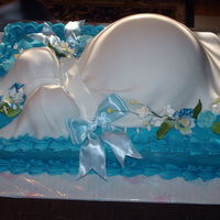 Baby Boy Belly I love doing the pregnant belly cakes, they are so elegant. This is the only one I have done for a boy though.