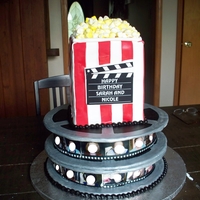 Movie Night This was a cake for a set of twins. They each had their own movie reel and the filmstrip was made with pictures of them for the film (...