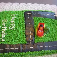 Race Car Track marble cake with buttercream frosting. This was a very last minute cake for my nephew. I got a call from my brother that they had just...