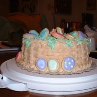Easter Basket Cake The cake is lemon cake with cheesecake filling. The eggs are NFSC with Royal Icing. My husband says it doesn't exactly look like an...
