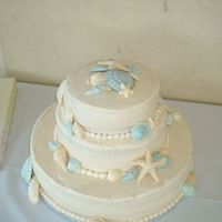 Beach Wedding This is my first "official" wedding cake. The couple was married in Mexico on the beach, then came back to have a beach themed...
