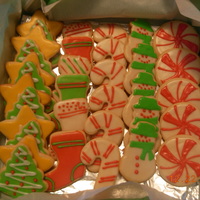 Christmas Cookies I made these cookies for my kids. They loved them. I used poured cookie icing from wilton book.