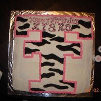 Texas Tech Zebra Print I made this cake for a girl's b-day. She loves Tech and zebra prints. This was my first time trying zebra prints. They are a little...