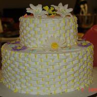 Diamond In The Ruff!! I done this, now completed though, to show my students how a basket weave can be beautiful for a tiered cake. I had brought some flowers to...