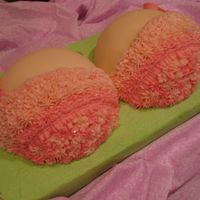 Bridal Bra This was made with the ball pan and with buttercream. I used a small amount of fondant for a super smooth look. I was pleased with the turn...