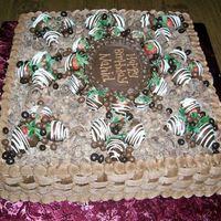 Carmel Mochaccino This was a HUGE birthday cake. Chocolate cake, Carmel filling (with a hint of coffee flavor), rich chocolate frosting with chocolate dipped...