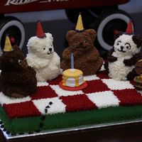 Teddy Bear Picnic Teddy bear picnic using the mini bear pan from wilton on a sheet. party hats and tiny birthday cake coated in royal icing. All else is...